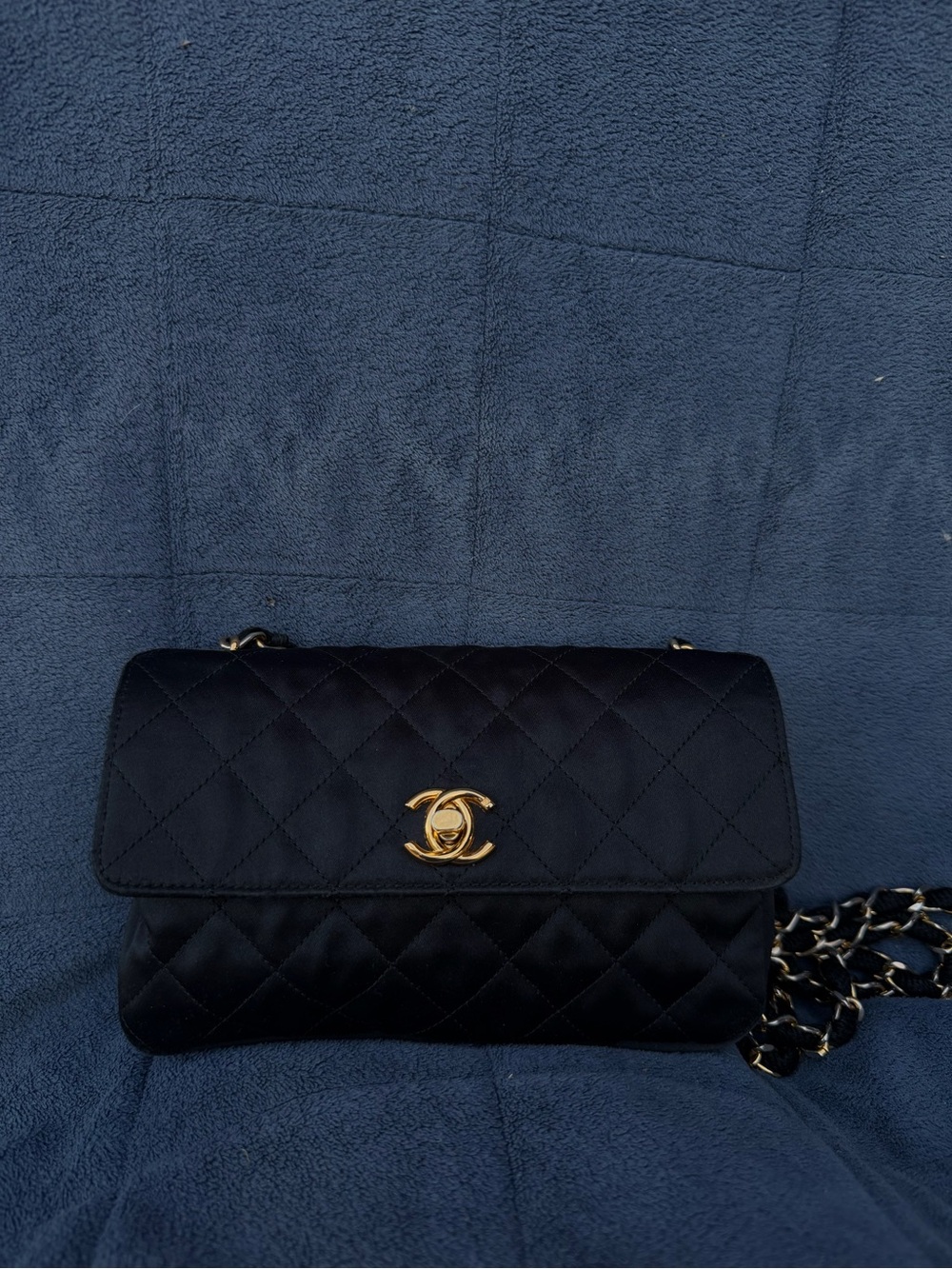 CHANEL Black Quilted Shoulder Bag with Gold CC Hardware
